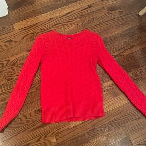Red cable knit sweater